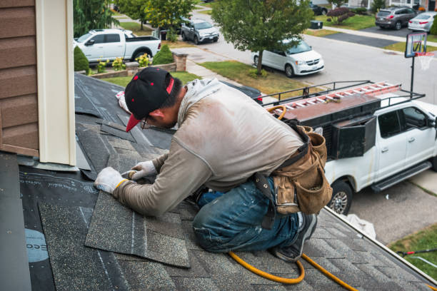Professional Roofing technician working in Fombell, PA